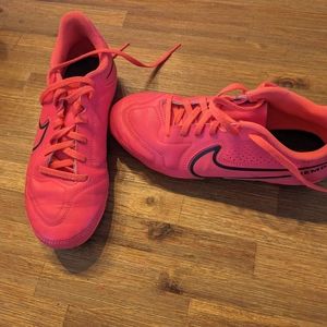 Hot pink Nike soccer cleats 5y